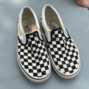 Black and white checkerboard Vans
